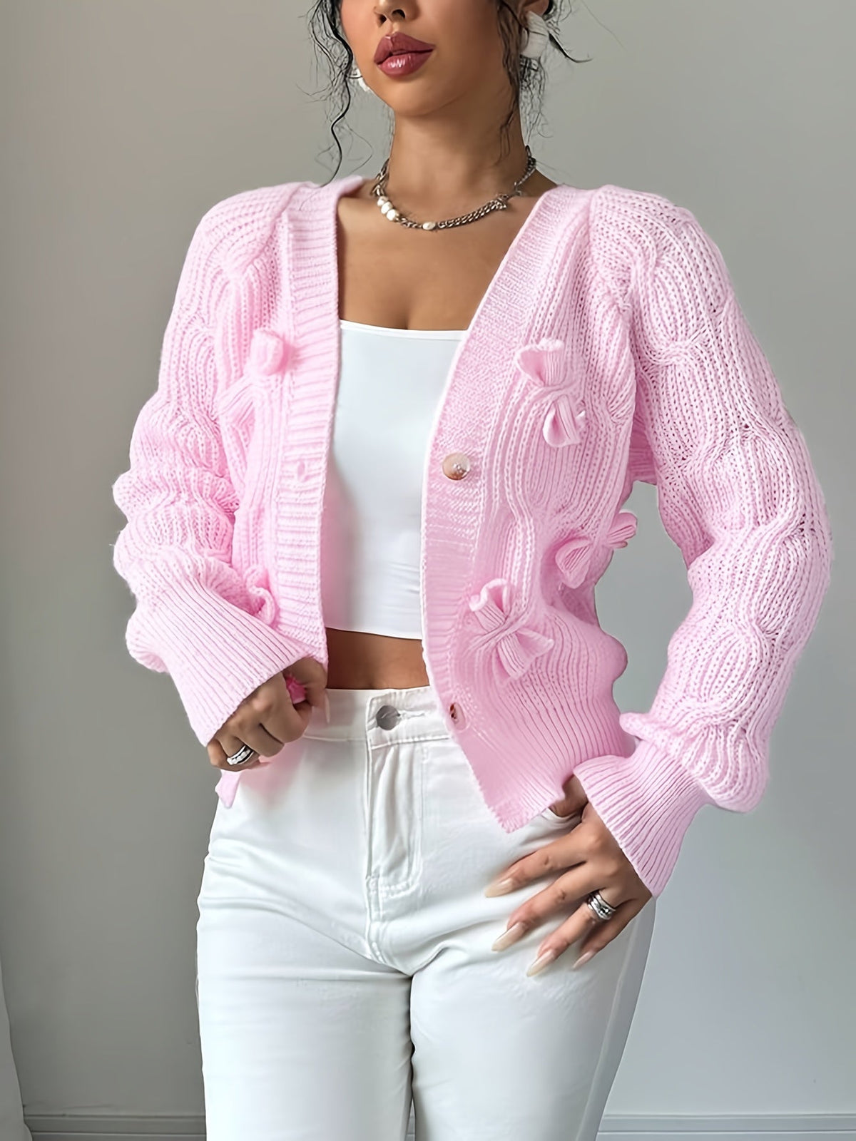 Perpetua – Bow-Detail Cable-Knit Cardigan