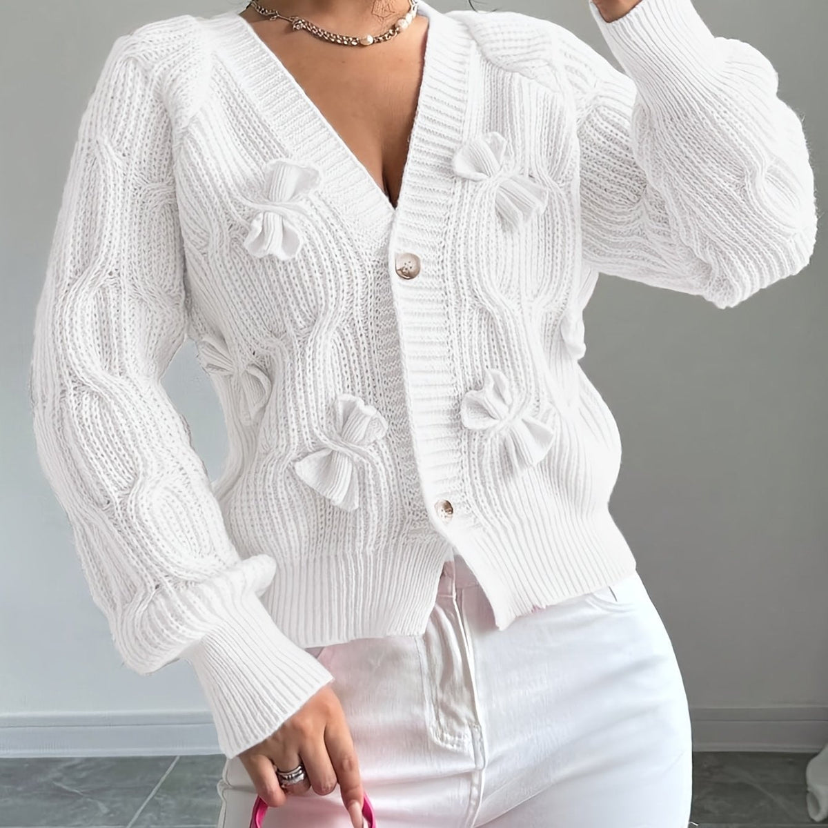 Perpetua – Bow-Detail Cable-Knit Cardigan