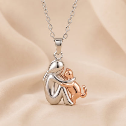 Bridie – Person and Dog Embrace Pendant Necklace