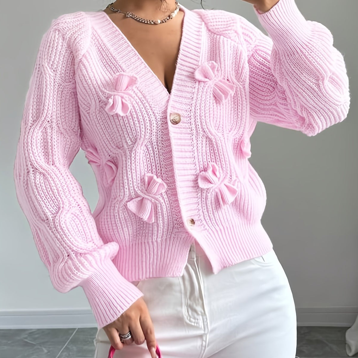 Perpetua – Bow-Detail Cable-Knit Cardigan